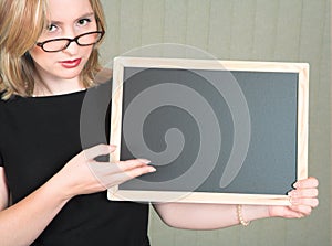 Teacher with blackboard