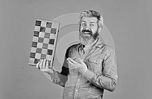 Teacher chess competition. Game strategy concept. Board game. Man playing chess. Intelligent bearded hipster. Cognitive