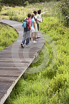 Teacher With Children On Field Trip