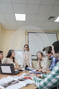 Teacher with college students in class