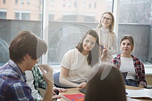 Teacher with college students in class