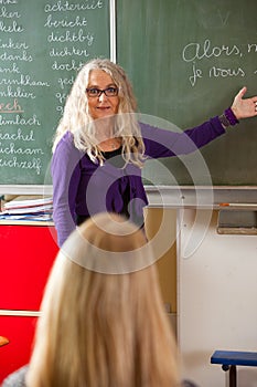 Teacher explaining photo