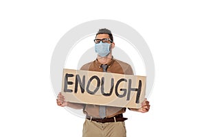Teacher in eyeglasses and medical mask holding signboard with enough lettering