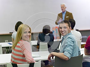 Teacher with a group of students in classroom