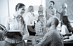 Teacher and happy adult students