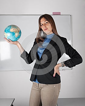 Teacher holding globe in hand