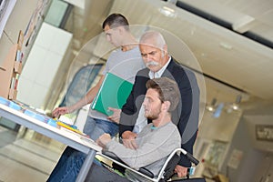 Teacher with kids in computing class