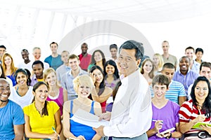 Teacher and large group of student in Lecture room