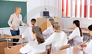 Teacher lecturing to medical students