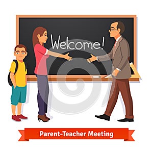 Teacher and parent meeting in classroom photo