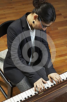 Teacher Playing Piano Keyboard
