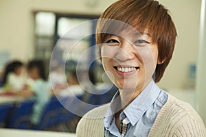 Teacher portrait at lunch in school cafeteria