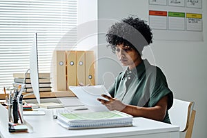 Teacher preparing for lesson at clss