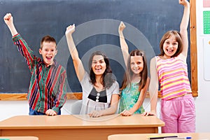 Teacher and pupils in classroom