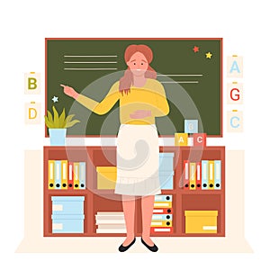 Teacher standing at blackboard in classroom, woman training teaching students of school