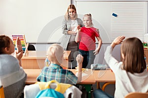 Teacher and student in the classroom during the first maths lesson