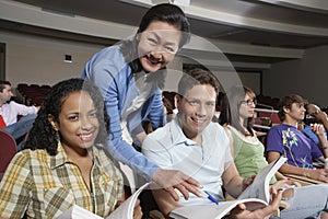 Teacher With Students In Classroom