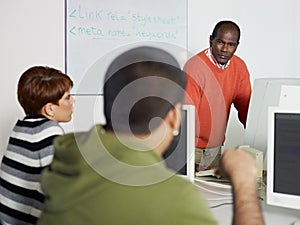 Teacher and students in college