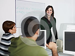 Teacher and students in computer class