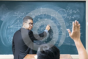 The teacher is teaching mathematics
