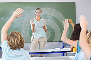 Teacher teaching students in class