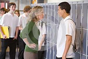 A teacher telling a student off photo