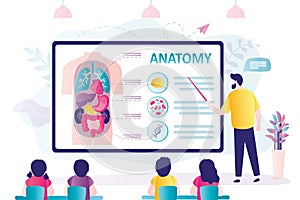 Teacher tells children about internal structure of human body. Anatomy lesson at school