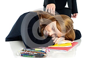 Teacher waking up a dozed off student