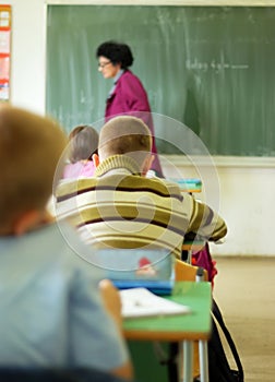 Teacher walking in classroom