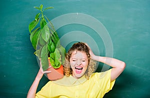 Teacher woman in glasses at biology lesson. school nature study. shouting student girl with plant at blackboard. tree of