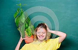 Teacher woman in glasses at biology lesson. tree of knowledge. school learning ecology. happy student girl with plant at