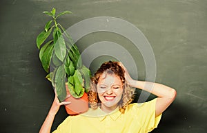 Teacher woman in glasses at biology lesson. tree of knowledge. school learning ecology. happy student girl with plant at
