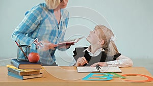 Teacher Writes Dictation with Student