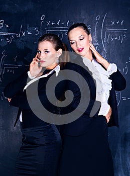 Teachers against a chalkboard