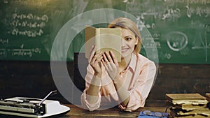 Teachers day. College female student is learning in the classroom.