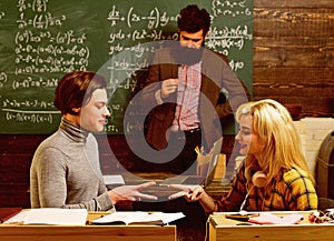 Teachers know about things that make students curious. Final exam test in university students study for examination in