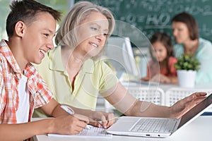 Teachers working with pupils