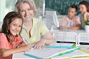 Teachers working with pupils