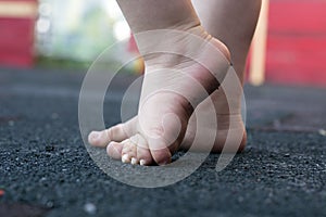 Teaching baby to walk outdoor