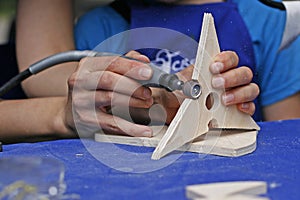 Teaching a child woodcarving