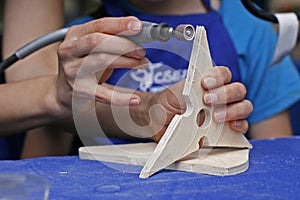 Teaching a child woodcarving