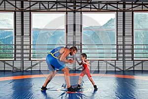 Teaching children Greco-Roman wrestling