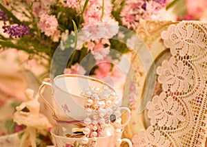 Teacups, ballet dancer statuette, frame photo