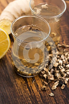 Teaglass with yellowhead root tea photo