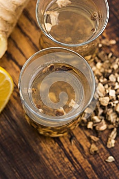 Teaglass with yellowhead root tea