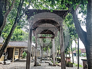 Teak carved gate in the courtyard of the Sunan Kalijaga pavilion