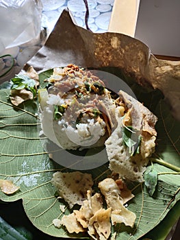 Teak leaf pecel is a typical food with teak leaves as a wrapper. Has a distinctive taste