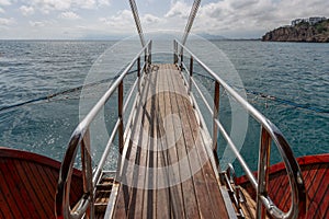 teak and stainless steel gangway at the bow