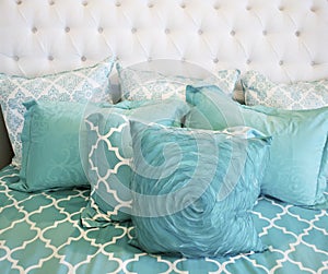 Teal cushions and bedding textiles