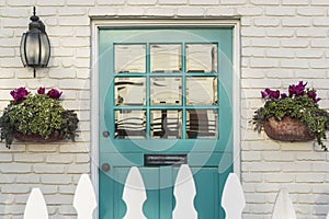 Teal front door of a classic home photo